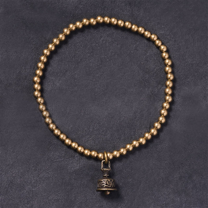 Buddha Stones Pulsera con colgante de campana y cuentas de cobre - image 1