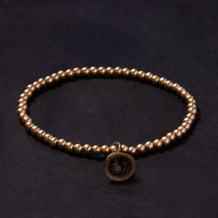 Buddha Stones Pulsera de la riqueza con cuentas de cobre, monedas chinas de cobre y campana. - image 1