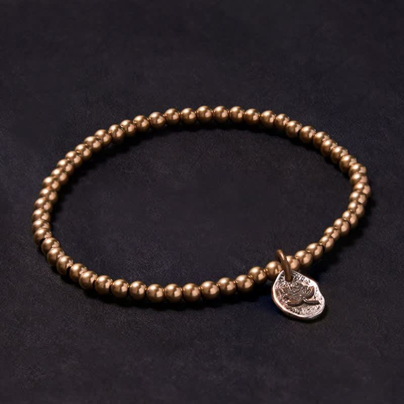 Buddha Stones Pulsera curativa con dije de loto y cuentas de cobre - 7,1–7,5 pulgadas (18–19 cm) - image 0