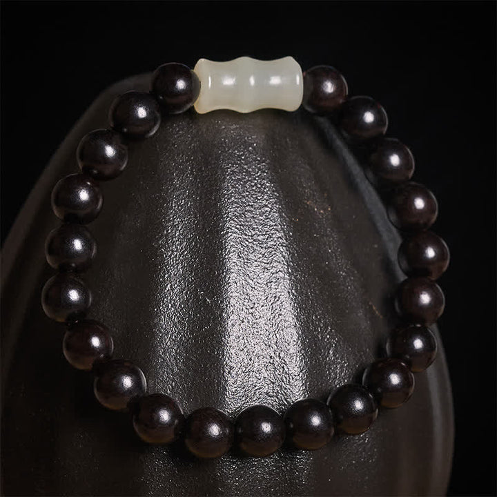 Buddha Stones Pulsera de protección vintage de madera de sándalo rojo, ébano y bambú - image 9