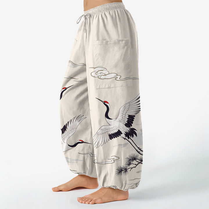 Buddha Stones Pantalones harem de algodón blanco con estampado de grullas y cintura elástica para mujer, con bolsillos laterales. - image 1