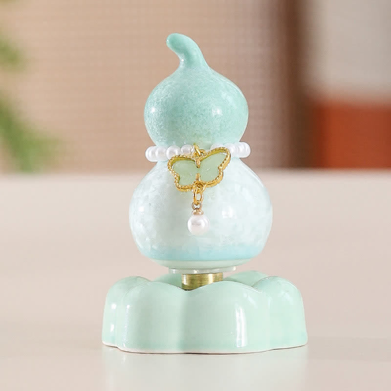 Buddha Stones Decoración giratoria de cerámica con forma de calabaza mariposa para un estilo de vida consciente. - Verde calabaza + Mariposa verde claro + Base verde - image 12