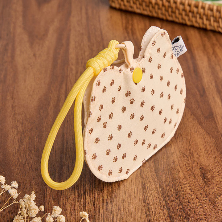 Buddha Stones Cartera con cierre a presión, estampado de huellas de gatito amarillo y blanco. - image 2