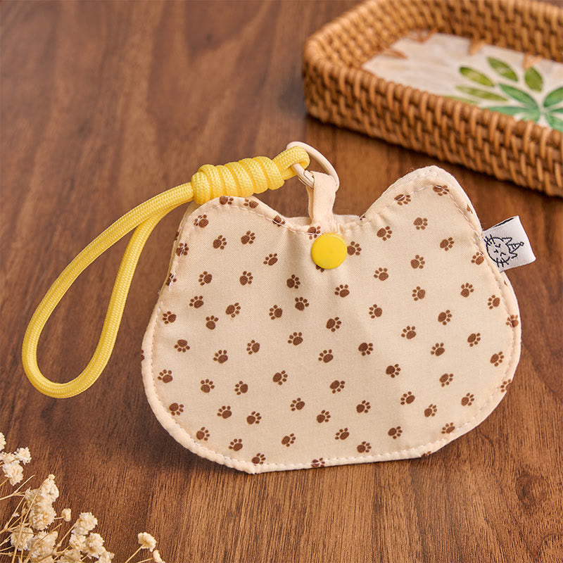 Buddha Stones Cartera con cierre a presión, estampado de huellas de gatito amarillo y blanco. - image 1