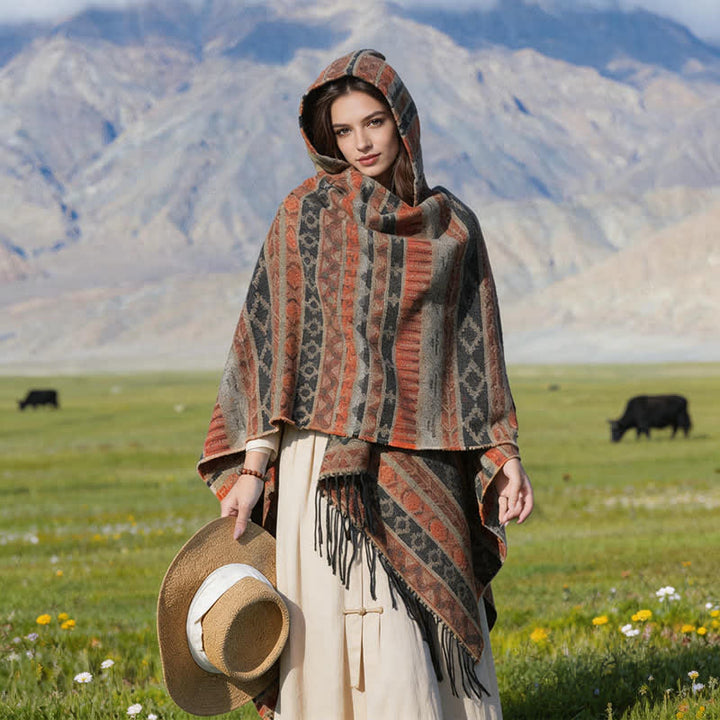 Buddha Stones Poncho con capucha, rayas geométricas y borlas para mujer, ideal para otoño e invierno. - image 6