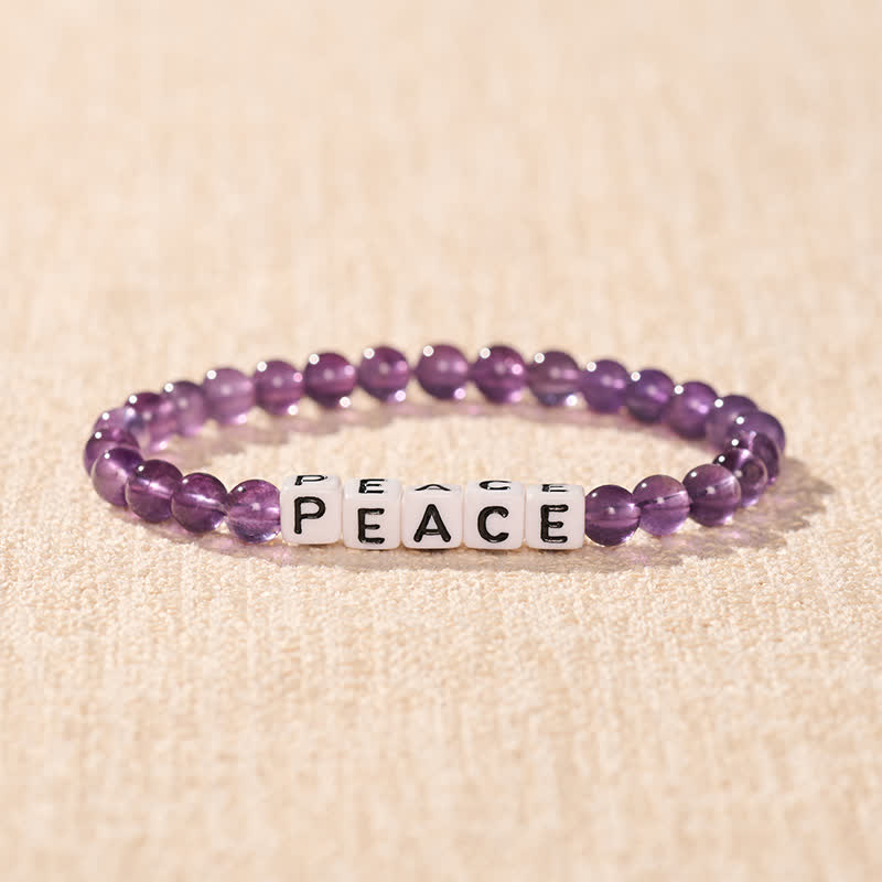 Buddha Stones Pulsera de meditación con cuentas de amatista con la inscripción PAZ - image 1