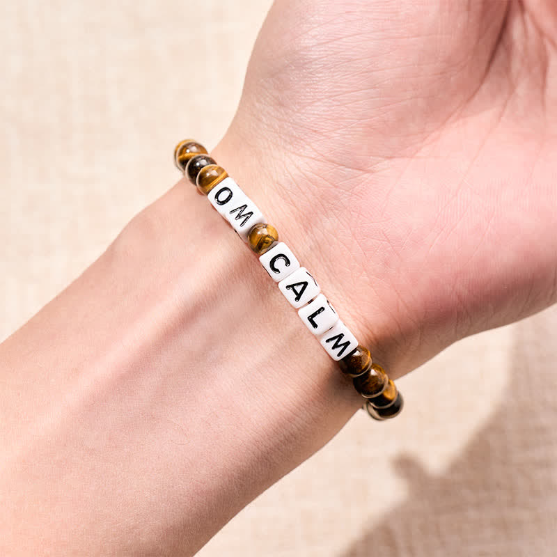 Buddha Stones Pulsera de cuentas con letras OM CALM y ojo de tigre - image 3