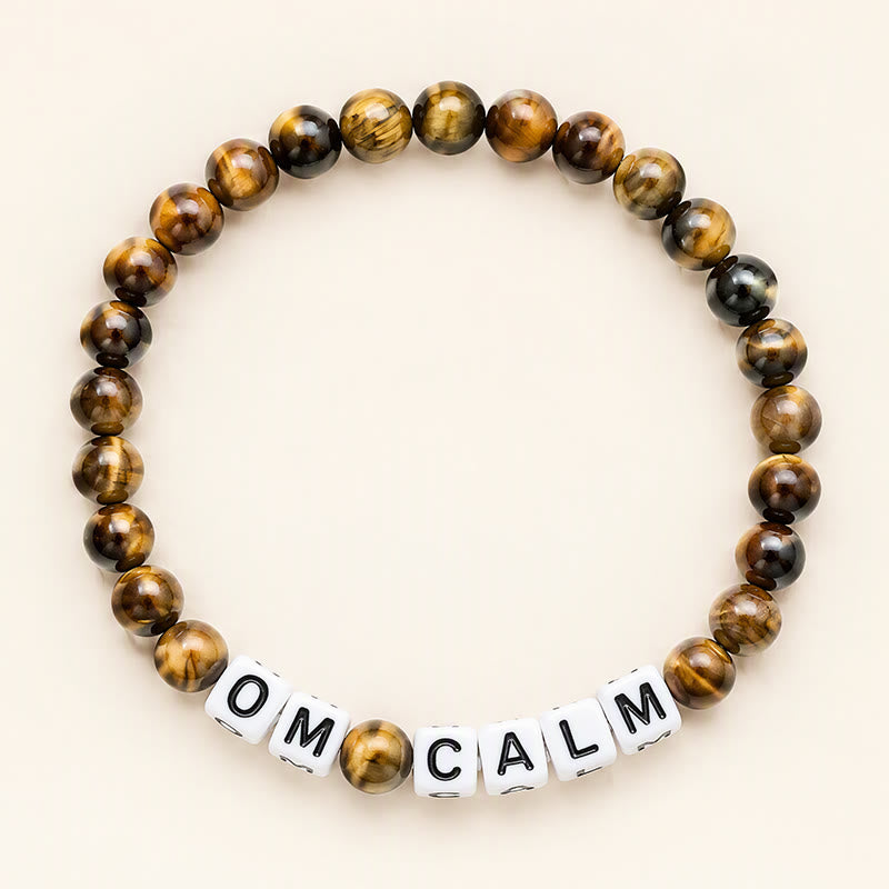 Buddha Stones Pulsera de cuentas con letras OM CALM y ojo de tigre - Ojo de Tigre (Protección ♥ Coraje) - image 0
