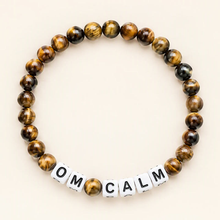 Buddha Stones Pulsera de cuentas con letras OM CALM y ojo de tigre - Ojo de Tigre (Protección ♥ Coraje) - image 0