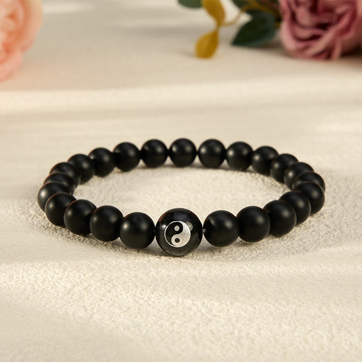 Buddha Stones Pulsera de equilibrio con cuentas redondas de ónix negro, turquesa blanca y yin yang de obsidiana negra. - Ónix negro - 5,9–6,3 pulgadas (15–16 cm) - image 0