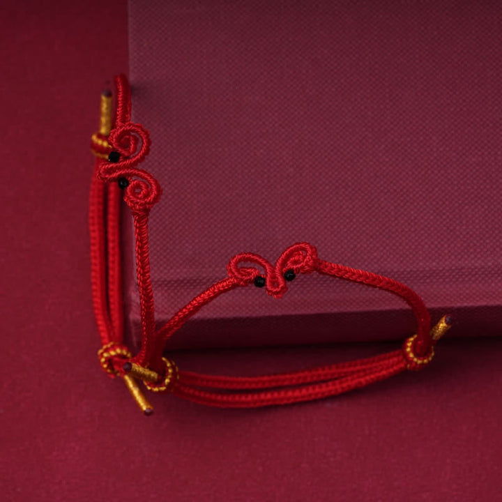 Buddha Stones Pulsera de la suerte con forma de cabra, tejida a mano con hilo rojo. - image 4