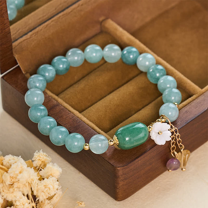 Buddha Stones Pulsera elástica protectora con dije de flor de jade - image 1