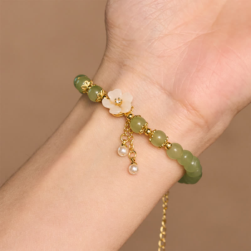 Buddha Stones Pulsera con dije de perlas y flor de la suerte inspirada en el jade Hetian de cobre - image 7