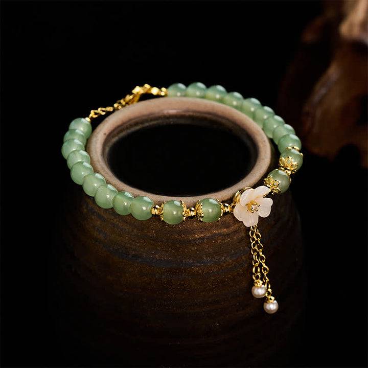 Buddha Stones Pulsera con dije de perlas y flor de la suerte inspirada en el jade Hetian de cobre - Jade (Abundancia ♥ Suerte) - image 0