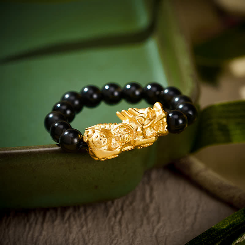 Buddha Stones Anillo elástico mini Pi Xiu de cobre y obsidiana negra para fuerza y ​​energía. - Grande: Se ajusta a las tallas 8-10 de US. - image 0