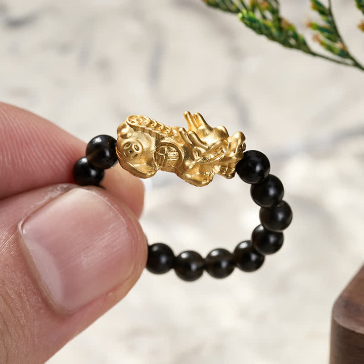Buddha Stones Anillo elástico mini Pi Xiu de cobre y obsidiana negra para fuerza y ​​energía. - image 4