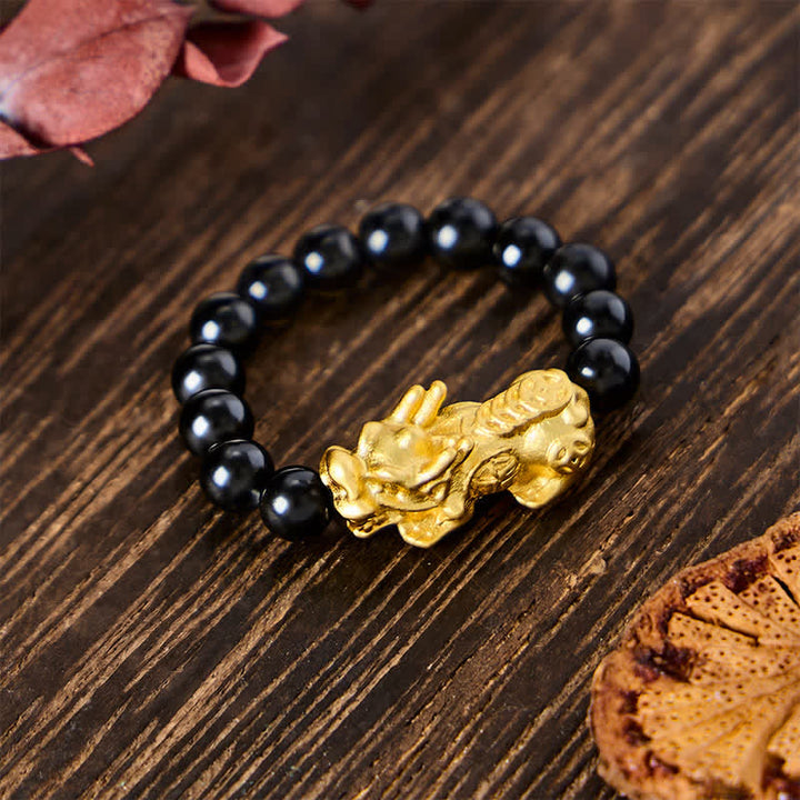 Buddha Stones Anillo elástico mini Pi Xiu de cobre y obsidiana negra para fuerza y ​​energía. - image 3