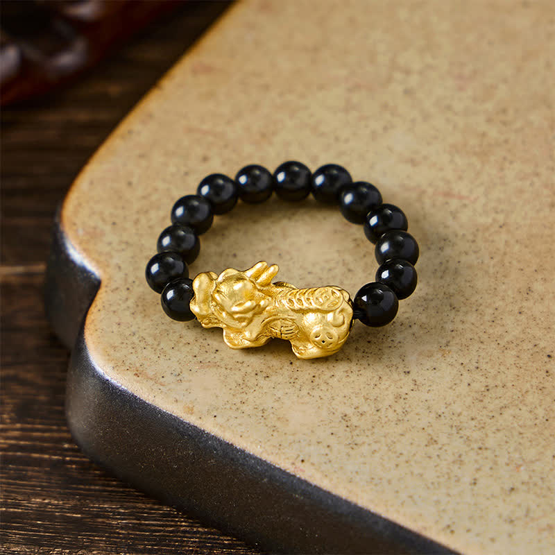 Buddha Stones Anillo elástico mini Pi Xiu de cobre y obsidiana negra para fuerza y ​​energía. - image 11