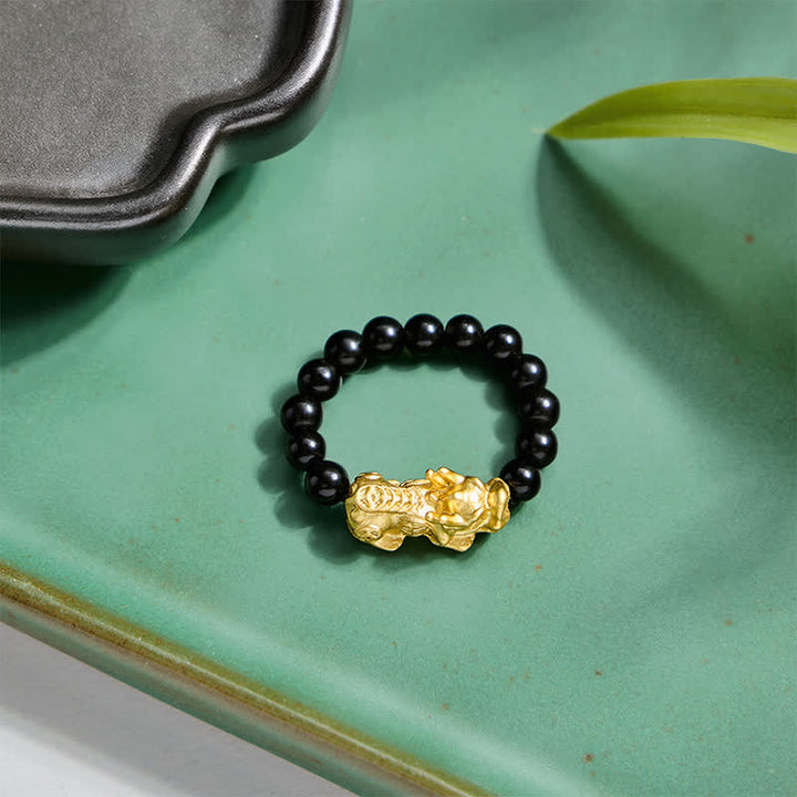 Buddha Stones Anillo elástico mini Pi Xiu de cobre y obsidiana negra para fuerza y ​​energía. - image 10