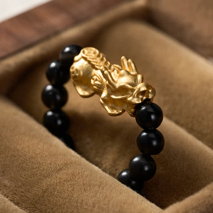 Buddha Stones Anillo elástico mini Pi Xiu de cobre y obsidiana negra para fuerza y ​​energía. - image 12