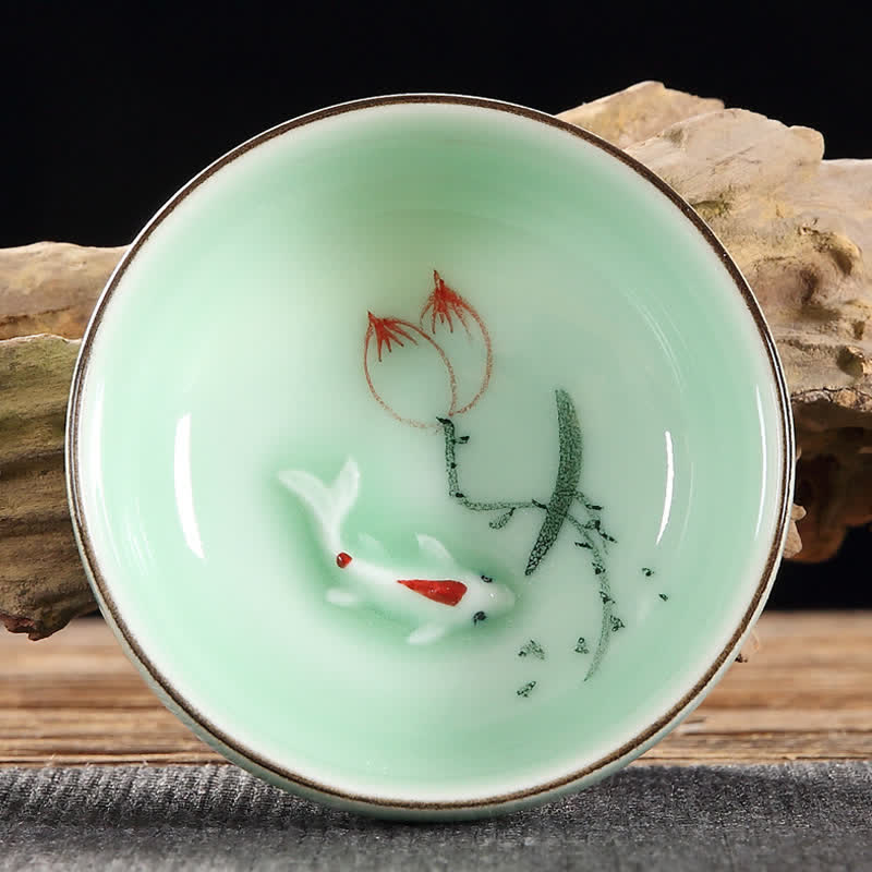 Buddha Stones Taza de té de cerámica pintada a mano con diseño de loto y peces koi, símbolo de prosperidad. - Dos lotos - image 1