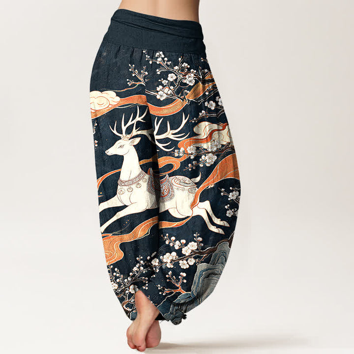 Buddha Stones Pantalones harem de cintura elástica para mujer con estampado de montaña y ciervos de algodón - image 1