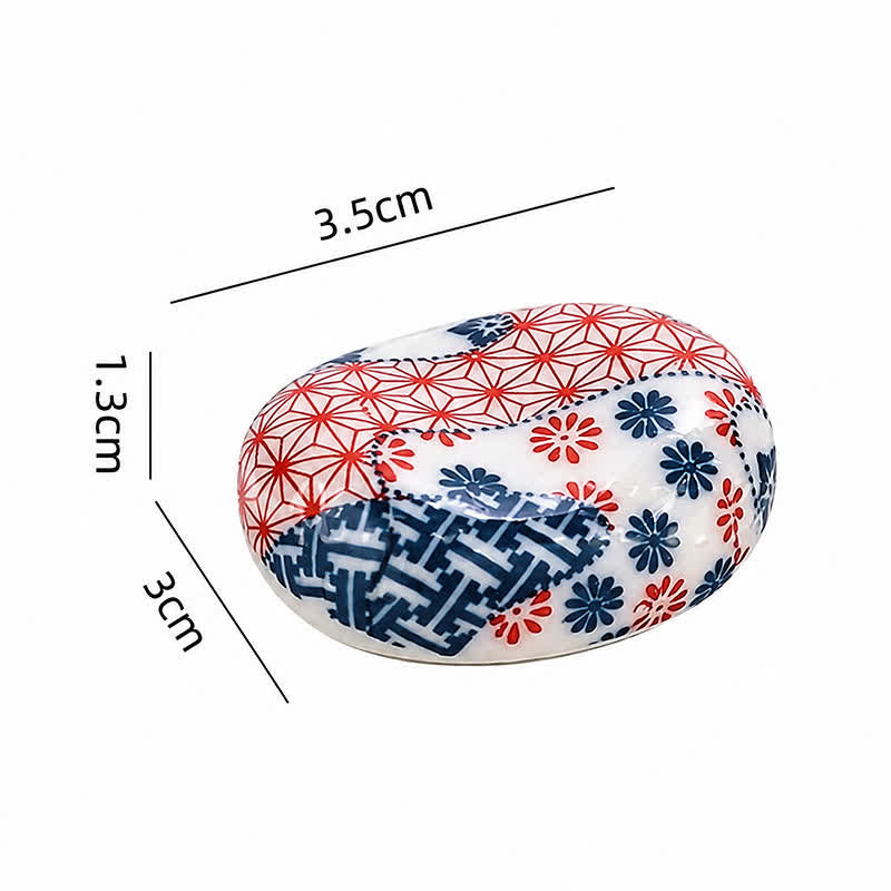 Buddha Stones Soporte ovalado de cerámica con diseño floral para palillos de habas - Diseño floral. Aprox. 3,5 × 3,0 × 1,3 cm. - Cerámico - image 1