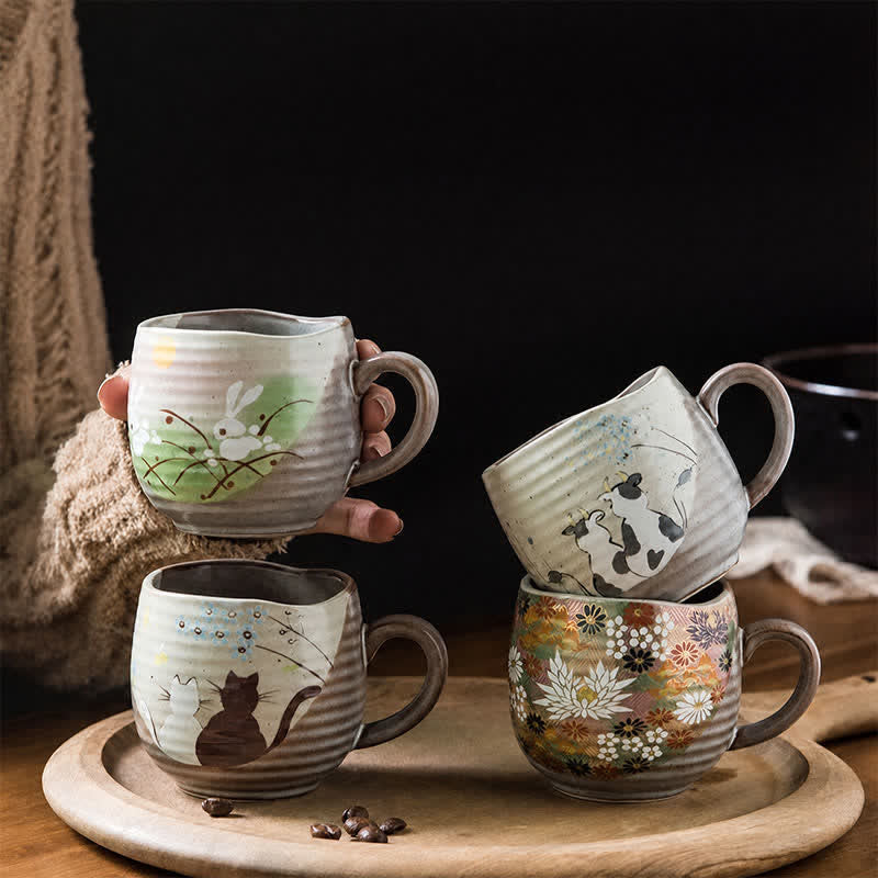 Buddha Stones Taza de té de cerámica japonesa Kutani pintada a mano con diseño de gato, flores, vaca, conejo y océano. - image 0