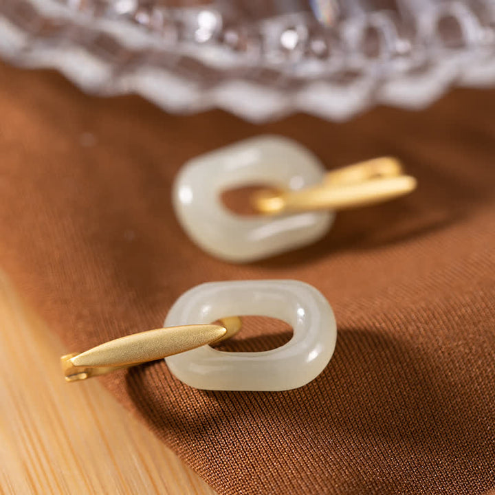 Pendientes de bendición de la felicidad de jade blanco redondo de plata de ley 925 con Buddha Stones