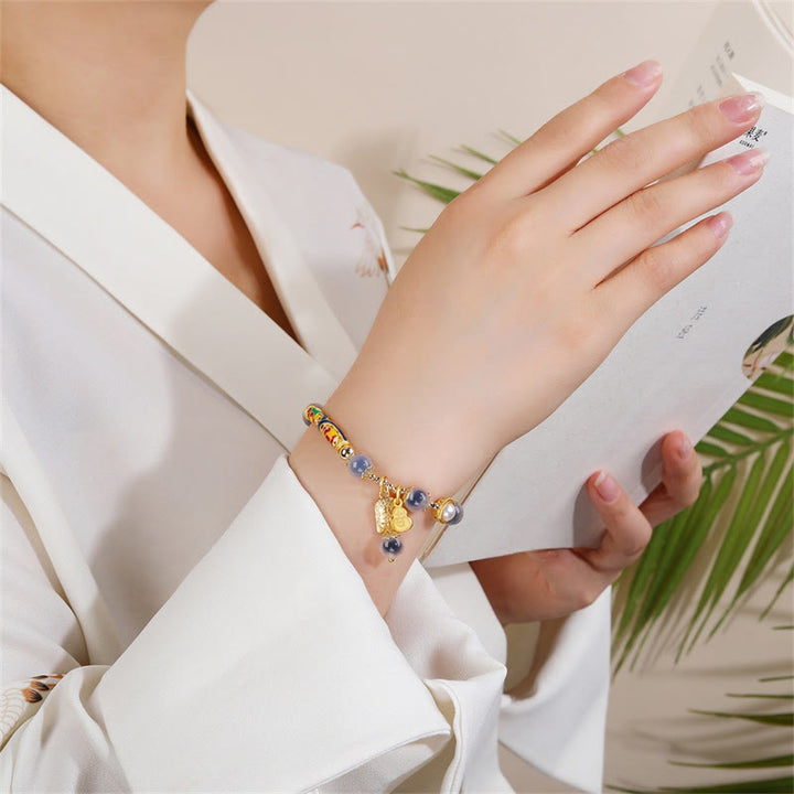 Pulsera de fuerza con amuleto de ágata de caramelo azul natural con Buddha Stones