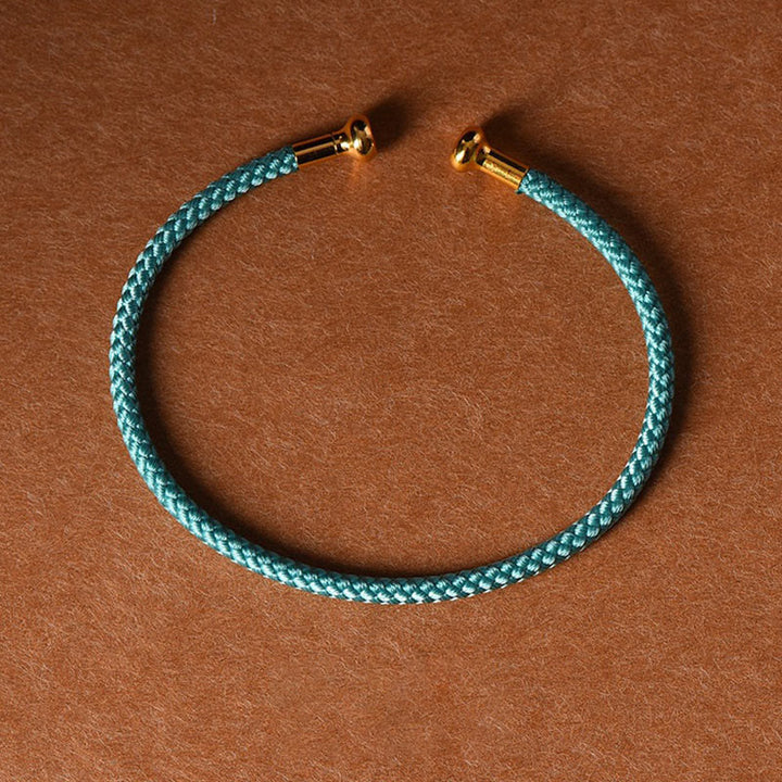 Pulsera de cuerda trenzada de la suerte hecha a mano con diseño simple de Buddha Stones - Cian - image 28