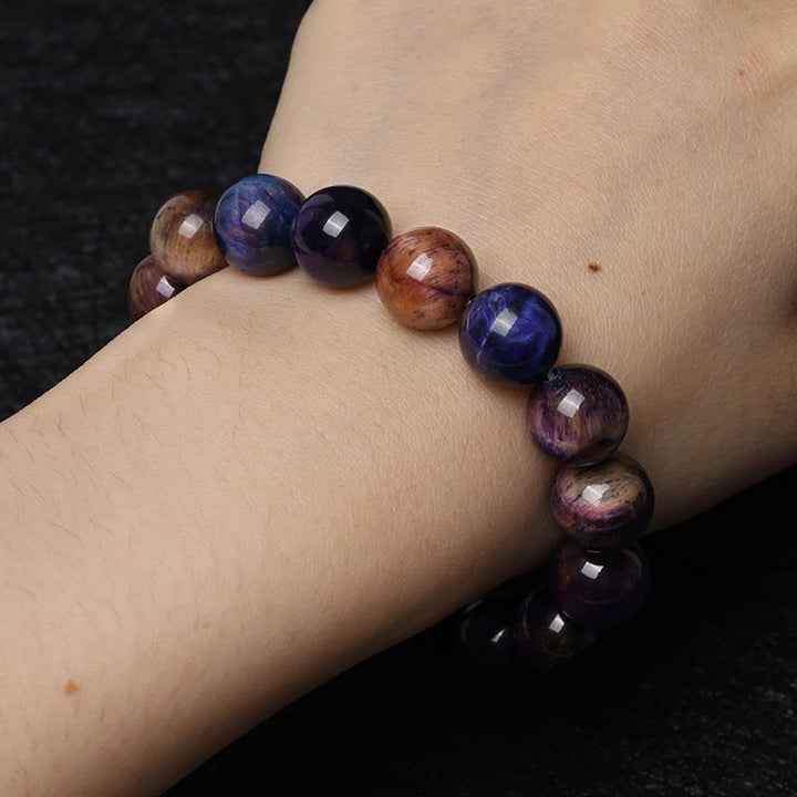 Pulsera de fuerza de protección de ojo de tigre púrpura natural de Buddha Stones