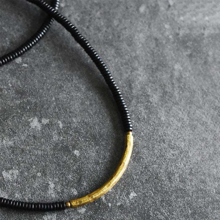Pulsera multicapa con equilibrio de cobre y madera de ébano con Buddha Stones
