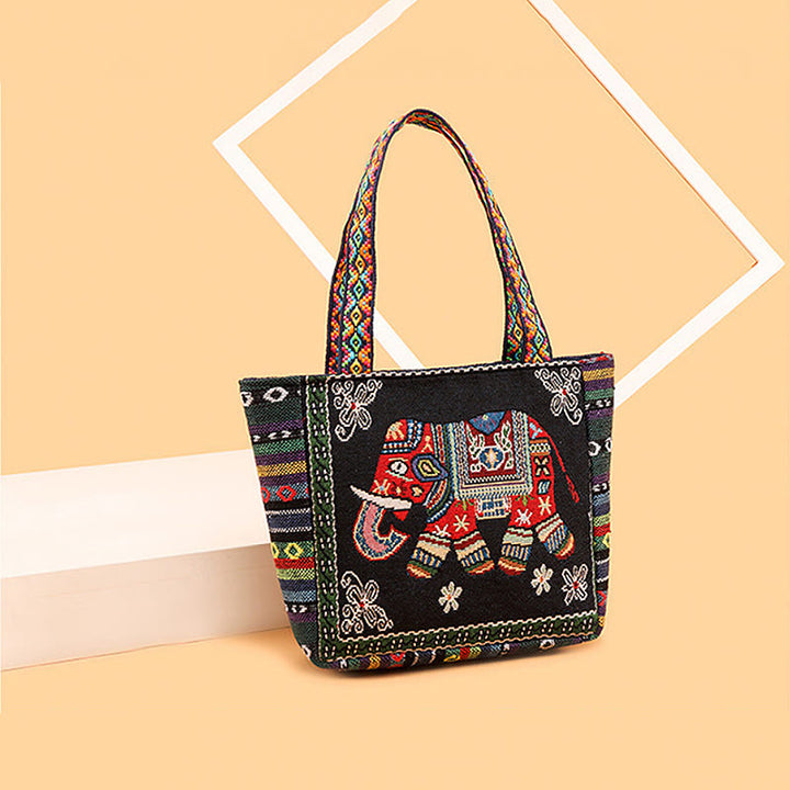 Bolso bandolera de lona de gran capacidad con bordado de mariposa y elefante