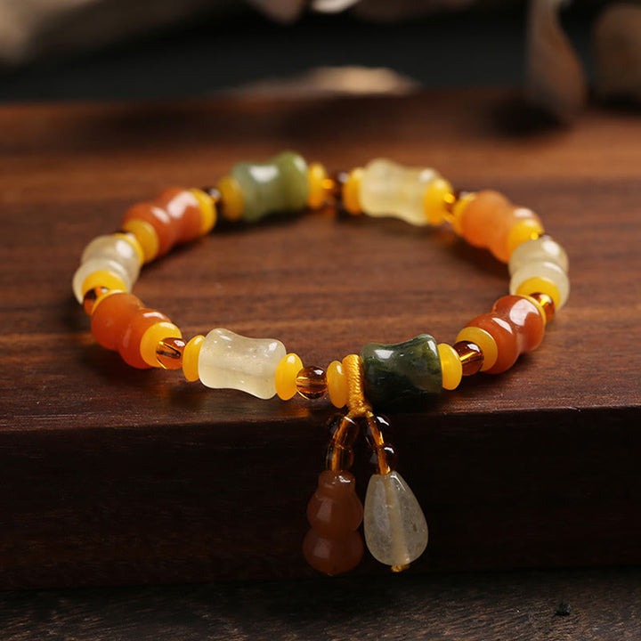 Pulsera con dijes de riqueza de calabaza de jade de seda dorada natural