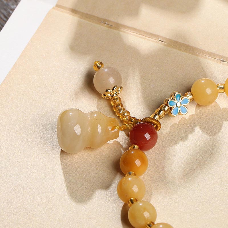 Pulsera de la suerte de la riqueza del encanto de la calabaza del jade de la seda dorada natural de las Buddha Stones
