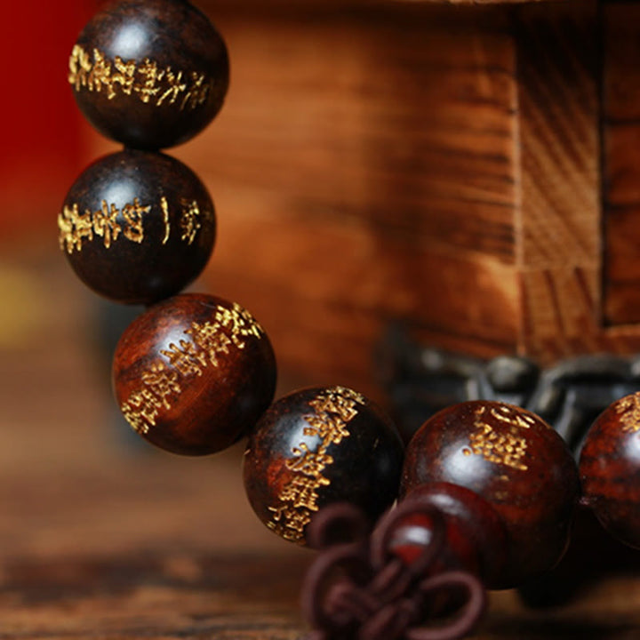Pulsera de curación grabada con sutra de corazón de palisandro tibetano