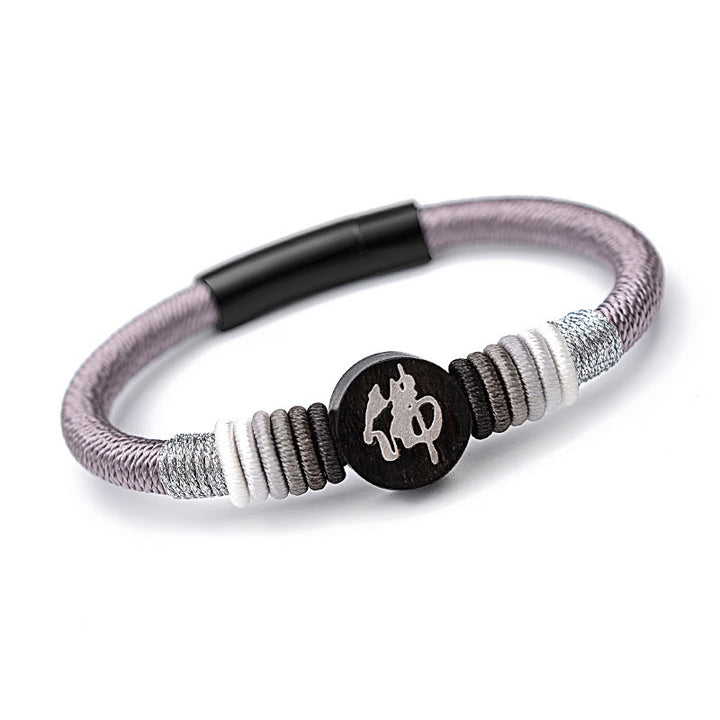 Pulsera de cuerda hecha a mano de ébano con personaje de Buda de Buddha Stones