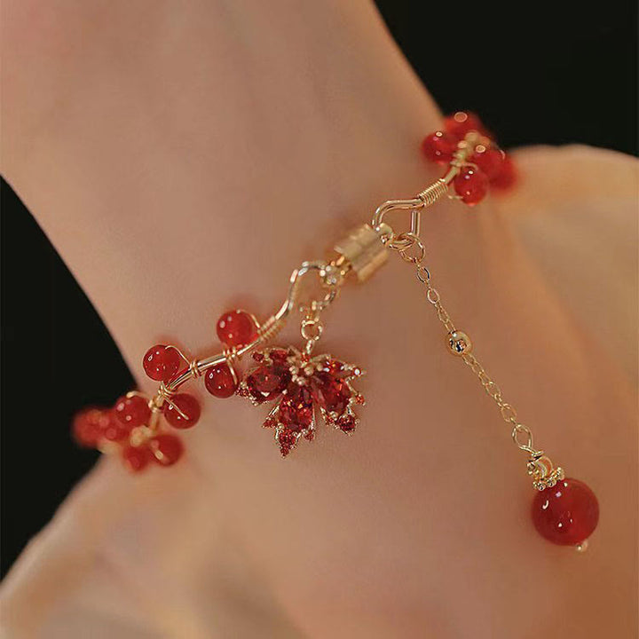 Pulsera con amuleto de la suerte de hoja de arce roja con Buddha Stones