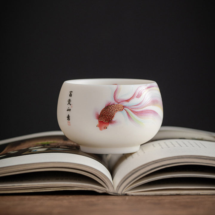 Taza de té de cerámica de porcelana blanca, pez Koi, Buddha Stones, taza de té de Kung Fu