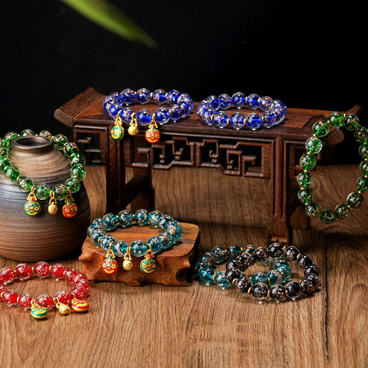 Pulsera de éxito con cuentas de cristal Liuli fluorescentes luminosas con abalorio familiar de bestia tragadora de oro con Buddha Stones