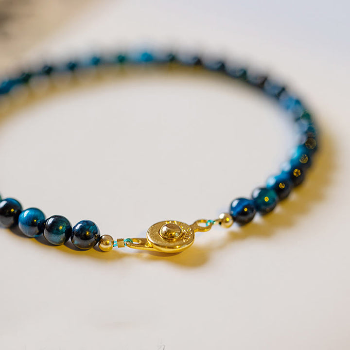 Pulsera de cadena de protección con piedra de ojo de tigre azul natural de Buddha Stones