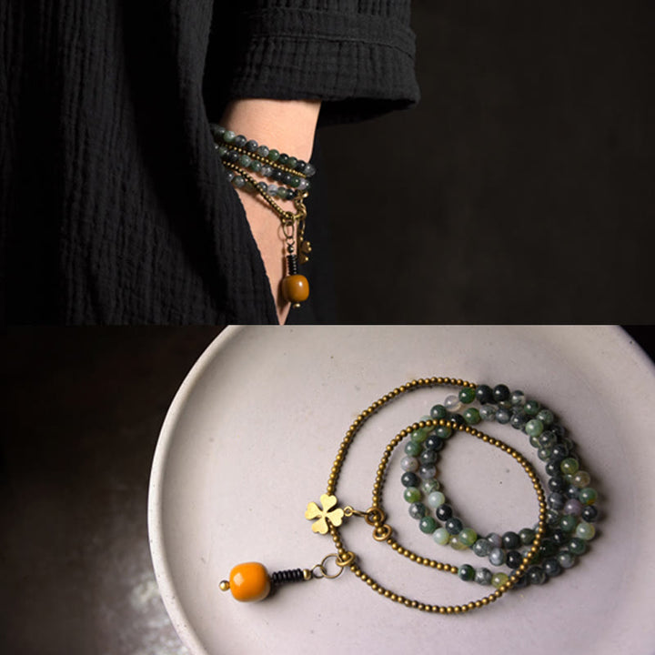 Pulsera multicapa de la suerte de cobre con ágata musgosa y Buddha Stones