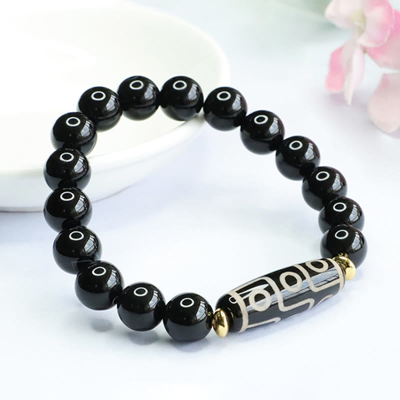 Pulsera de poder de ónix negro con cuentas Dzi tibetanas de nueve ojos de Buddha Stones