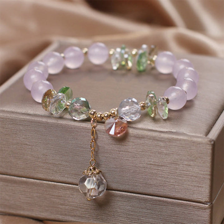 Pulsera con dije de paz y cristal rosa con ojo de gato y Buddha Stones - Calcedonia púrpura - image 9