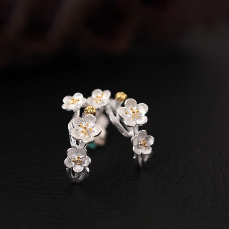 Pendientes de bendición floral de flor de ciruelo de plata de ley 925 con Buddha Stones