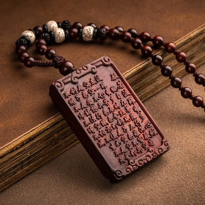 Colgante de collar de protección de sándalo rojo de hoja pequeña de Buda natal del zodiaco chino