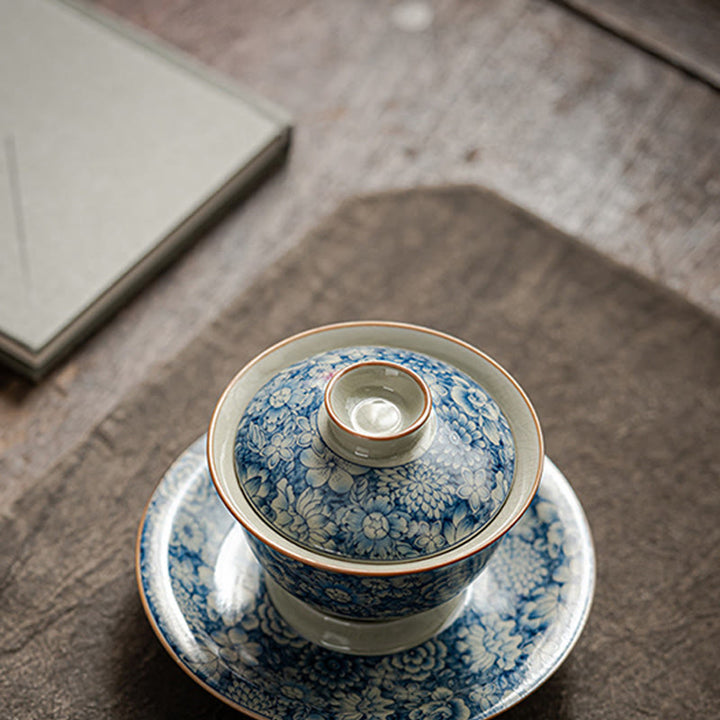 Buddha Stones azul y blanca vintage Flor de durazno Loto Peonía Cerámica Gaiwan Sancai Taza de té Kung Fu Taza de té y platillo con tapa