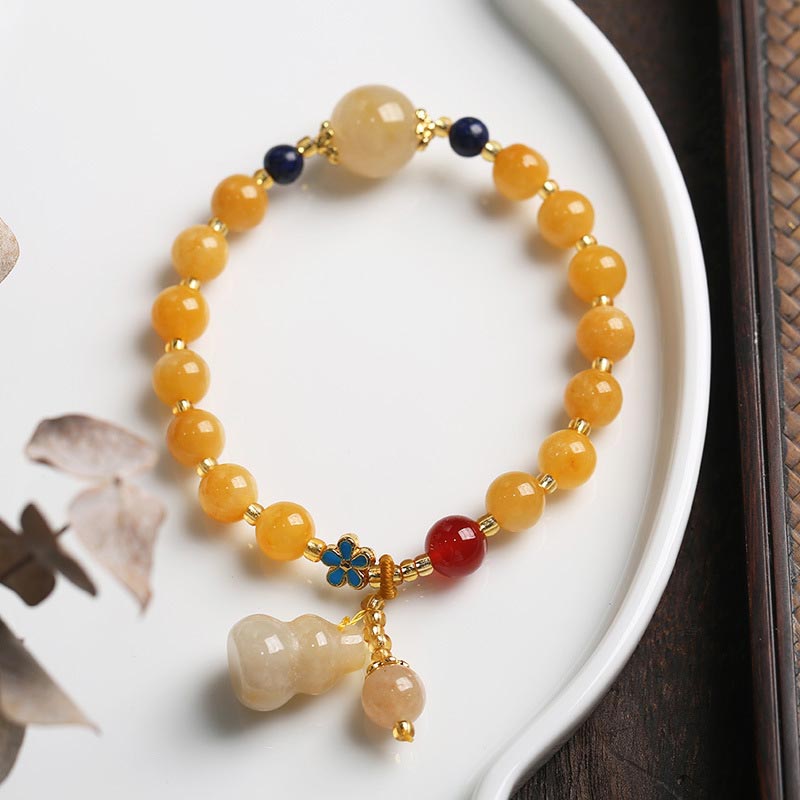 Pulsera de la suerte de la riqueza del encanto de la calabaza del jade de la seda dorada natural de las Buddha Stones