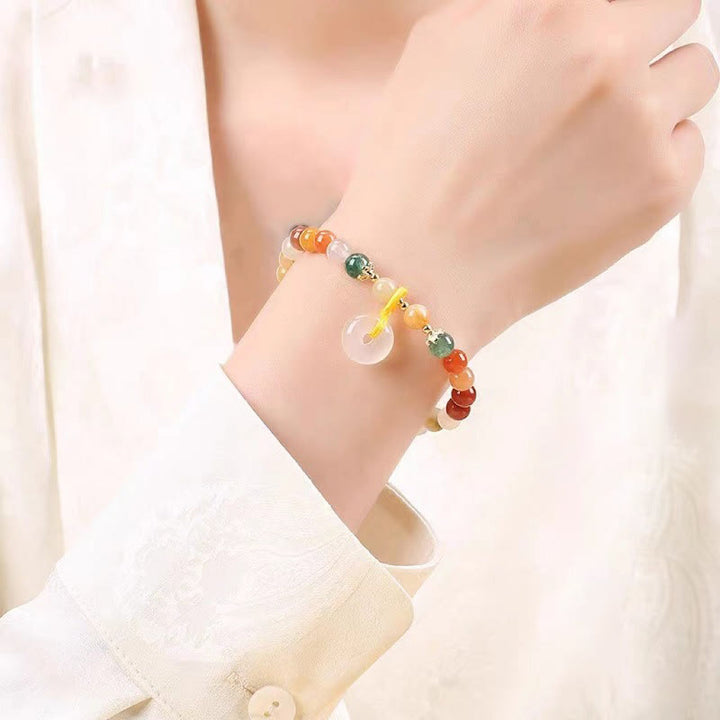 Pulsera de riqueza con hebilla de paz de jade de seda dorada colorida chapada en oro de 14 Buddha Stones